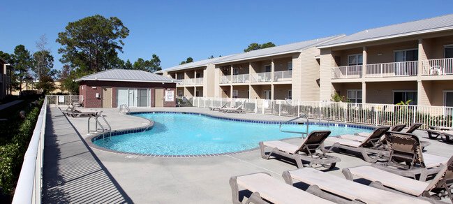 Community pool with lounge seating